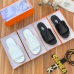 High-quality slides in white and black, presented in stylish orange boxes on a wooden background.